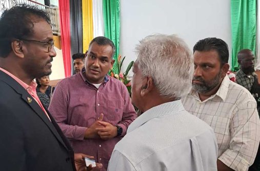 R3PSInc Head, Halim Khan (at left) with participants at the job fair many of whom were eager to learn about opportunities in Guyana