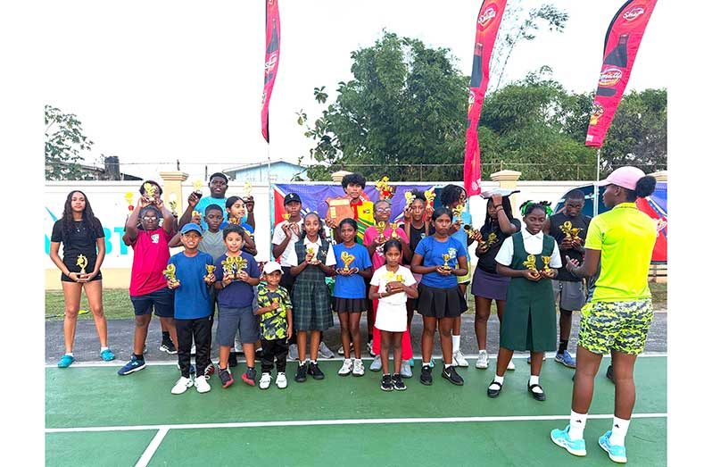 Participants proudly show off their trophies