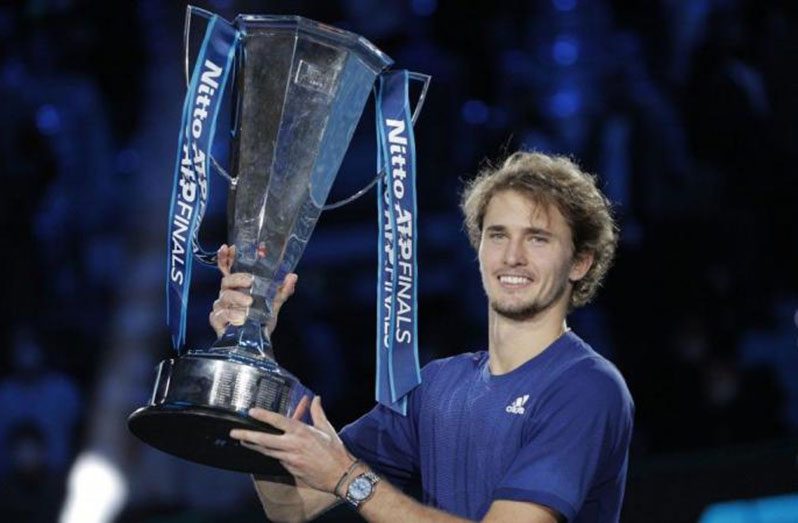 Alexander Zverev celebrates with the ATP Finals Trophy