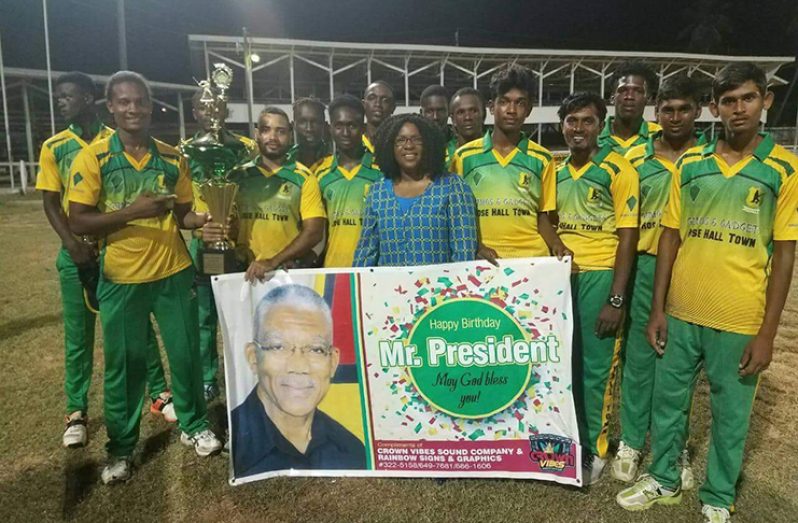 RYTY&SC cricket team pose with Junior Minister of Health Dr Karen Cummings at the conclusion of the presentation.