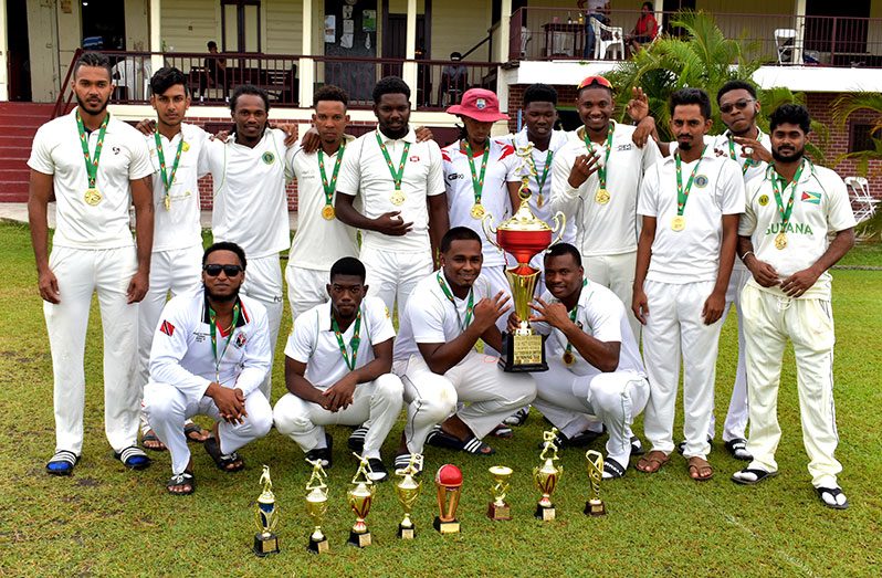 The victorious Demerara Cricket Club celebrate their triumphant defence of the Georgetown Cricket Association First-Division Two-Day title (Photo: Elvin Croker)