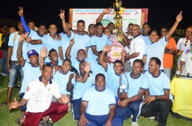 Flashback! We are the champions! The victorious Trophy Stall team strike a pose with the GFSCA ‘Guyana Softball Cup 111’ Male Open title, after being crowned champions last year. Stooping at left is Managing Director of Trophy Stall, Ramesh Sunich. (Photo by Adrian Narine)