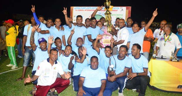 Flashback! We are the champions! The victorious Trophy Stall team strike a pose with the GFSCA ‘Guyana Softball Cup 111’ Male Open title, after being crowned champions last year. Stooping at left is Managing Director of Trophy Stall, Ramesh Sunich. (Photo by Adrian Narine)