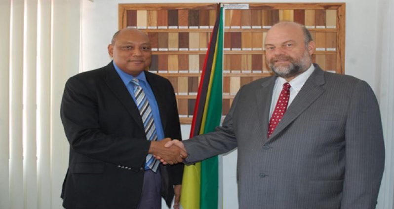 Minister of Governance Raphael Trotman and United States Ambassador Perry Holloway after the meeting at the minister's Brickdam Office on Wednesday