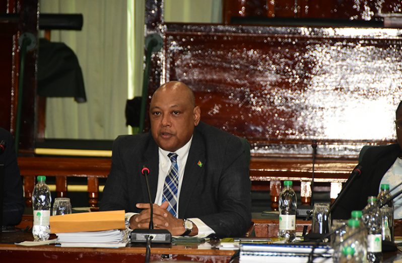 Minister of Natural Resources, Raphael Trotman before the Parliamentary Sectoral Committee on Natural Resources, Friday (Adrian Narine)