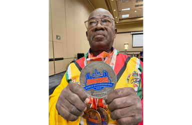 Tucker displaying his new medal