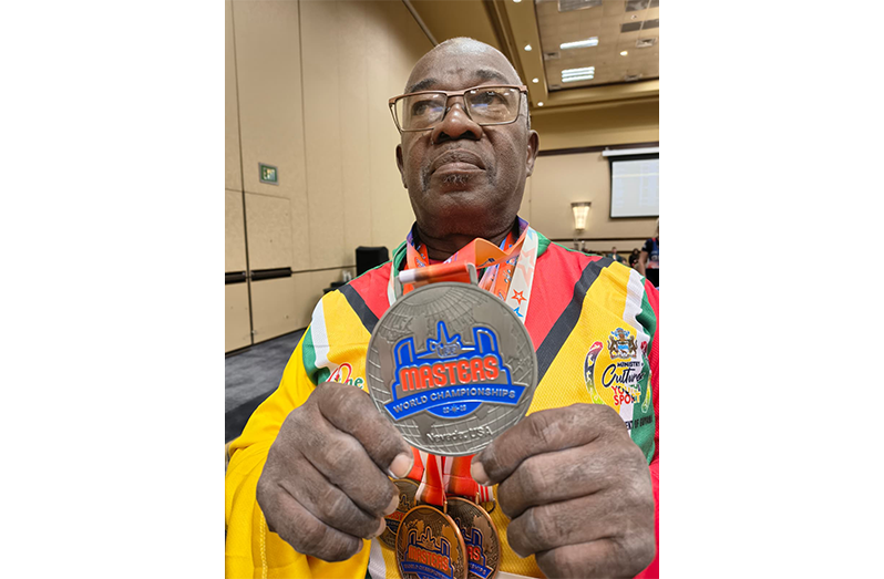Tucker displaying his new medal