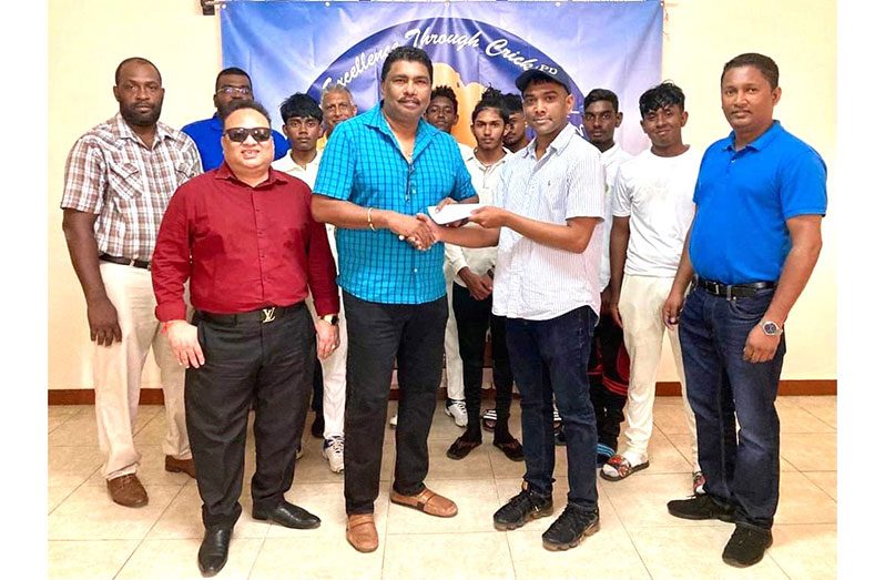 Beharry left receiving the cheque from Persaud in the presence of DCB executives and players who are expected to participate