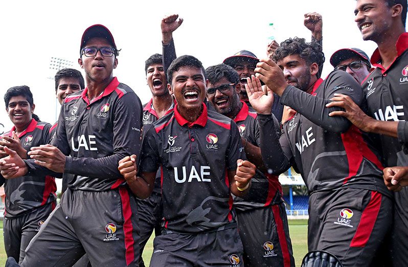 The UAE team celebrate their victory over Ireland in the final of the T20 World Cup Qualifier in Oman.