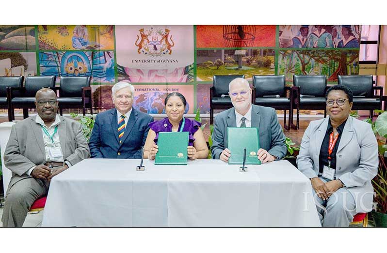 UG’s Vice-Chancellor Professor Paloma Mohamed-Martin and Dr. Bryan DePoy, Provost of Saint Leo University who signed the agreement on behalf of President Dr. James Burkee. Also in photo are Dr. Robert Robertson, Senior Research Fellow, Commonwealth Institute School of Advanced Studies, University of London [2nd left]; Prof Leyland Lucas, Dean, School of Entrepreneurship and Business Innovation (SEBI) [extreme left]; and Dr. Jacqueline Murray, Director of the Institute for Distance and Continuing Education (IDCE), both of the University of Guyana
