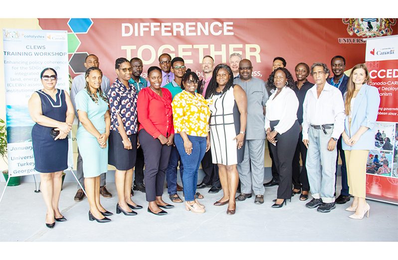 University of Guyana’s Vice-Chancellor, Prof. Paloma Mohamed Martin (extreme left); Deputy Vice-Chancellor (Institutional Advancement), Dr Melissa Ifill (back row -second from right), facilitators and participants at the opening ceremony last Monday