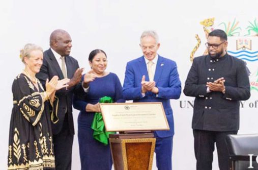 Standing at the podium, from right, are: President Dr. Mohamed Irfaan Ali, former British Prime Minister Tony Blair, University of Guyana’s Vice-Chancellor Professor Paloma Mohamed Martin, Rt Hon. David Lammy, and Nicola Green at a function at the University of Guyana to celebrate the inauguration of the Sophia Point Rainforest Research Centre in 2023