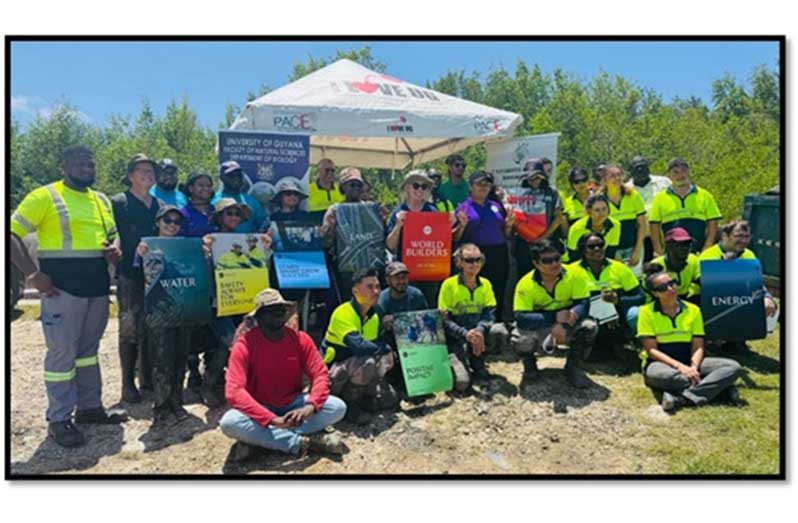 Representatives of the University of Guyana Biology Club, Jan De Nul, the British High Commission, the Protected Areas Commission, the Centre for the Study of Biological Diversity, and Ecotrust Society pictured during the mangrove clean-up exercise at Chateau Margot