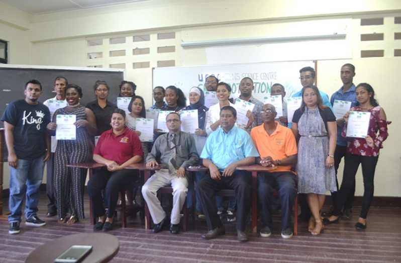 Participants of the workshop along with Director UGBC Gomathinayagam Subramanian and CEO Nand Persaud and Company Limited (second from right sitting) Mohinda Persaud  and staff of  UGBC at the closing ceremony of the workshop