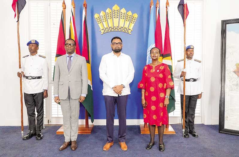 President Irfaan Ali with the newly accredited UN Resident Coordinator, Ms. Jean Kamau, (right) and Minister of Foreign Affairs and International Co-operation, Hugh Todd (left)