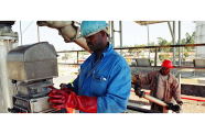 Workers undertake tasks at an industrial plant in Ethiopia (ILO Photo/Marcel Crozet)