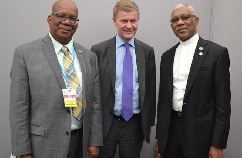 From left- Minister of Finance, Honourable Winston Jordan, Mr. Erik Solheim, Under Secretary-General of the United Nations and Executive Director of the United Nations Environment Programme (UNEP) and President of Guyana, His Excellency, David Granger