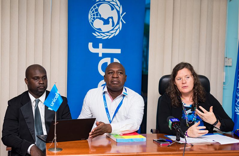 UNICEF Communication Specialist, Frank Robinson; UNICEF Country Representative, Sylvie Fouet; and Monitoring and Evaluation Specialist Michael Gillis at the press briefing on Thursday (Delano Williams photo)