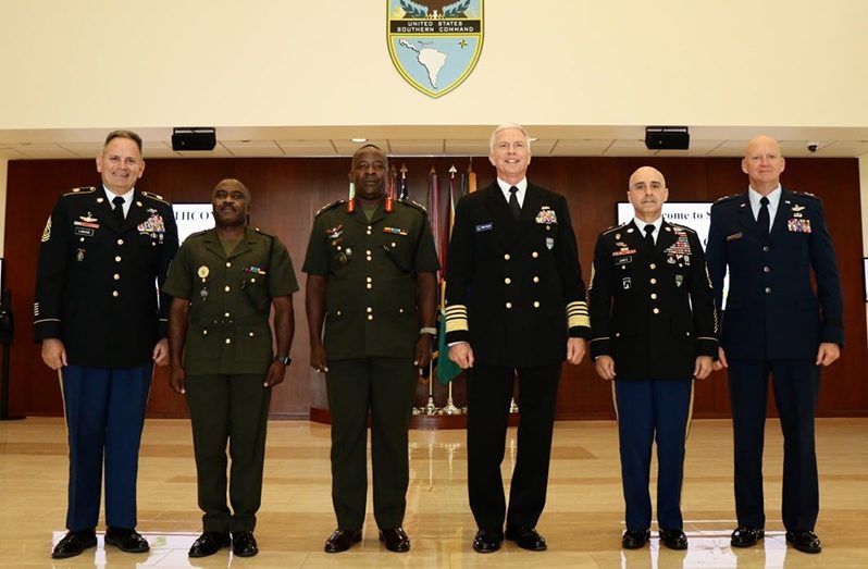 Chief-of-Staff Brigadier Godfrey Bess and US SOUTHCOM Commander, Admiral Craig Faller (third and fourth left respectively) and  other senior army officers at US SOUTHCOM Headquarters in Miami, Florida