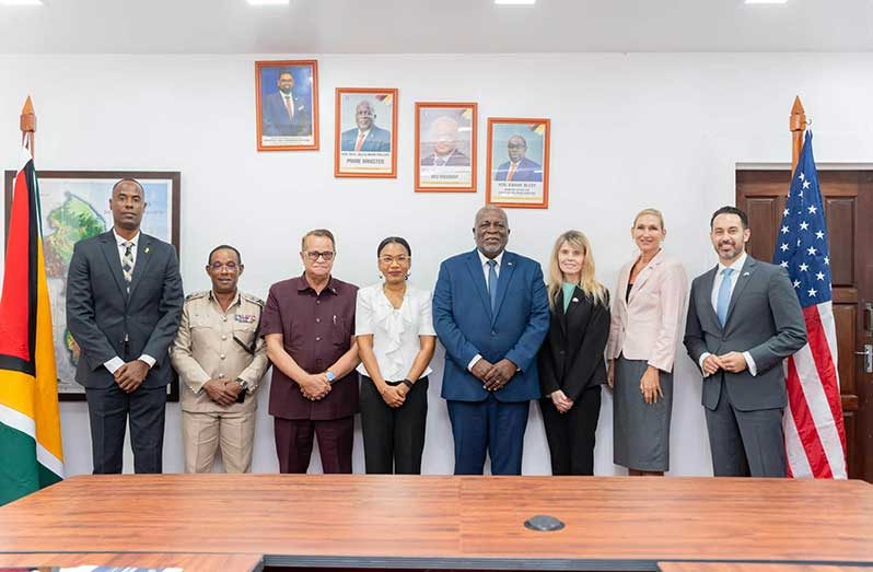 Prime Minister, Brigadier (Ret’d) Mark Phillips, performing the functions of President, United States Ambassador to Guyana Nicole Theriot, a delegation of senior US law enforcement officials and local officials at the Office of the Prime Minister.
