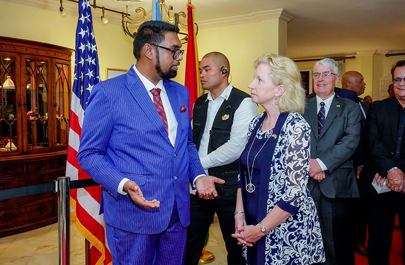 President Dr. Irfaan Ali (left) and U.S. Ambassador to Guyana, Sarah-Ann Lynch, at the Independence Celebration on Thursday evening (Latchman Singh photo)