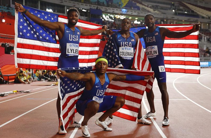 Christian Coleman, Justin Gatlin, Michael Rodgers and Noah Lyles of the U.S. celebrate after winning gold at Khalifa International Stadium, Doha, Qatar. (REUTERS/Kai Pfaffenbach)