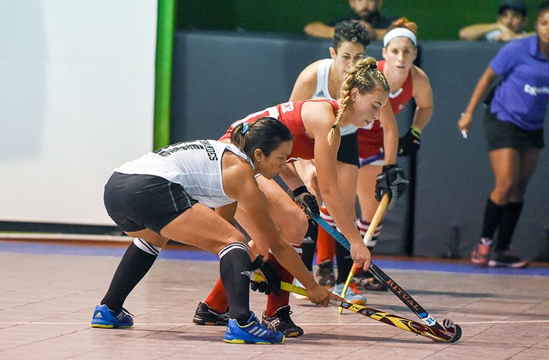 FLASHBACK! Guyana’s Madison Fernandes (first from left) battles the USA in the 2017 Indoor Pan Am Cup at Cliff Anderson Sports Hall.