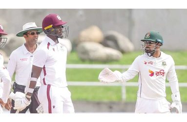 Umpire Kumar Dharmasena observes one of many engagements between the two sides on day three  •  (Athelstan Bellamy)