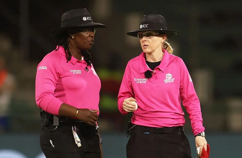 Umpire Williams (left) Umpire Cotton