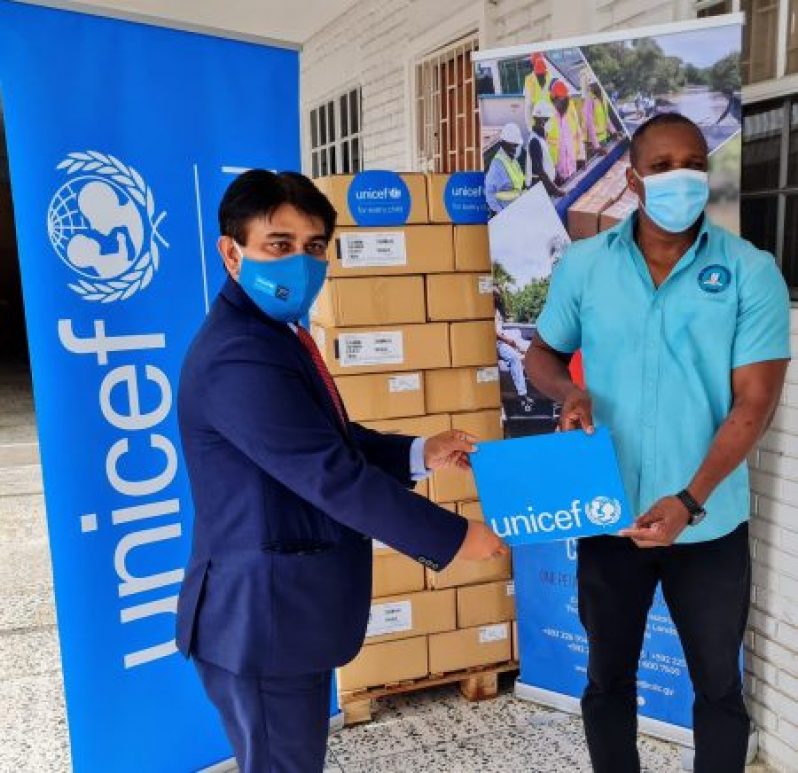 UNICEF representative, Irfan Akhtar (left) during the presentation on Tuesday (CDC photo)