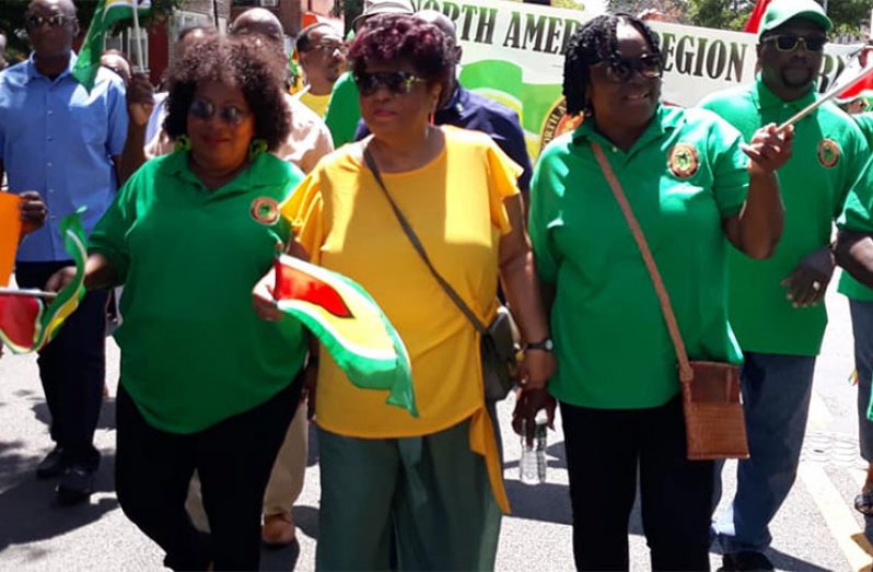 Social Protection Minister Amna Ally (third from right) surrounded by supporters at the Guyana Unity Rally in Brooklyn, New York, on Sunday