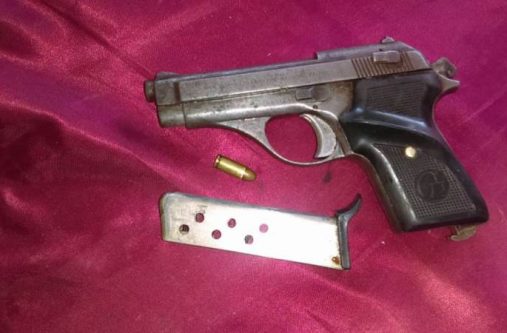 The unlicensed firearm and ammo found by the police