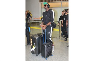 Usain Bolt lands in Brazil after a flight from London on Wednesday night.