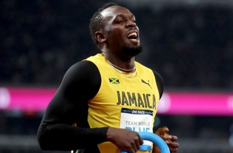 Multiple Olympic and World Champion Usain Bolt 'competes' on the track at the opening of the Tokyo 2020 Olympic Stadium.