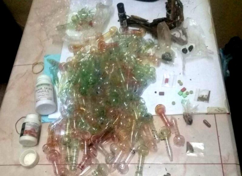 The utensils and hashish which were found in the men's possession.