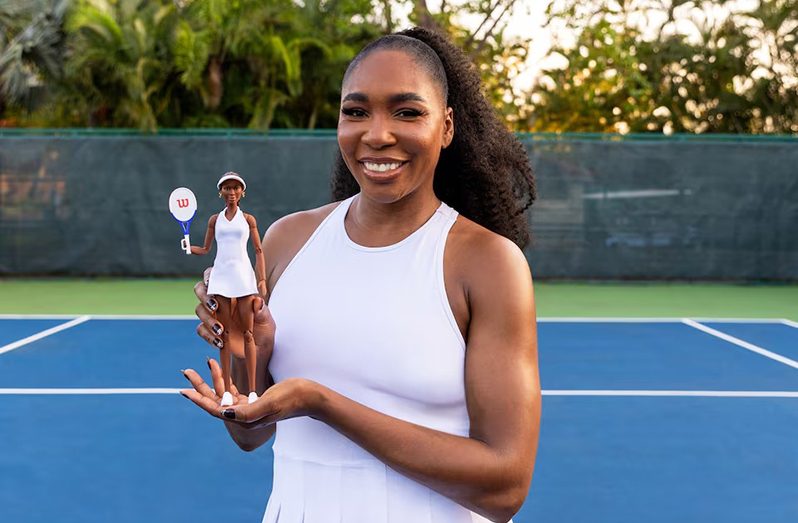U.S. Tennis player, Venus Williams, poses with a Barbie doll, in Puerto Rico in this undated handout image (Mattel/WME Sports Studio/Handout via REUTERS)