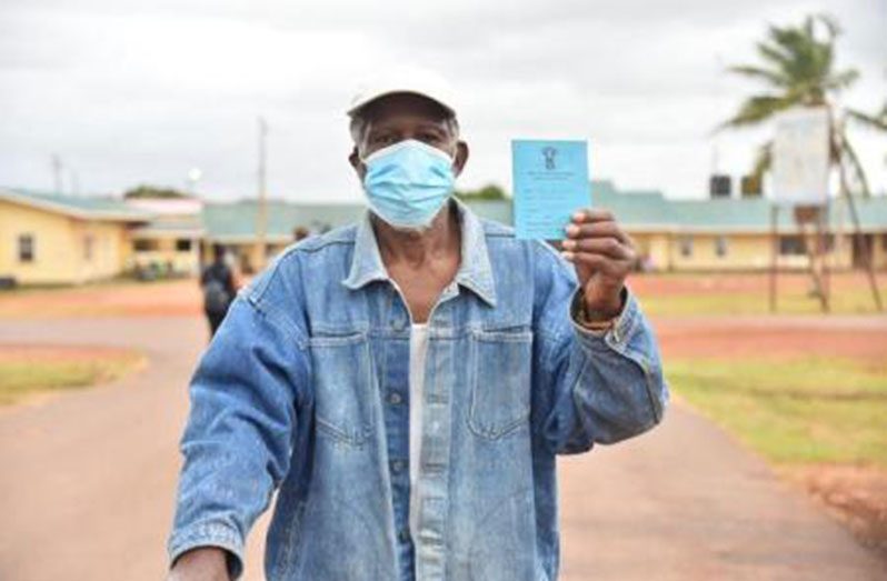 This gentleman indicates that he has received his COVID-19 vaccine (DPI photo)