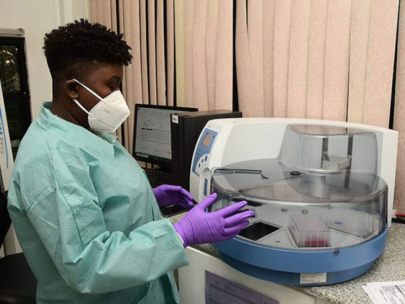 Genetic materials that allow microbiologists to determine whether a patient sample contains markers for the COVID-19 virus are being extracted from samples collected from individuals at the Eureka Medical Laboratory (Adrian Narine photo)