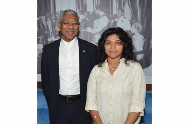 President David Granger stands alongside Former First Lady, Varshnie Singh, during a visit by the latter to the Ministry of the Presidency in 2016