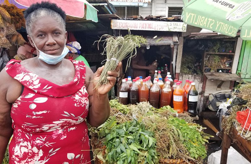 Debra Payne with some of the herbs she sells