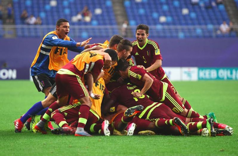 The Venezuelans eventually battled past Japan. (JUNG YEON-JE/Getty Images)