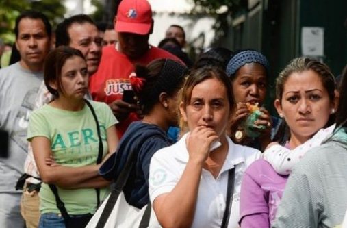 Venezuelans have grown accustomed to having to queue for hours to get some of their daily staples. [Photo taken from BBC]