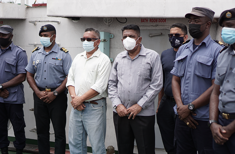 Minister of Agriculture, Zulfikar Mustapha (fourth from right) and Chief Fisheries Officer, Denzil Roberts (third from left) flanked by members of the Coast Guard at the Guyana Defence Force (GDF) Coast Guard Headquarters, Ramp Road, Ruimveldt, Georgetown during a visit to the site on Friday (Elvin Croker photo)