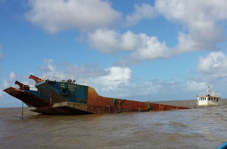 The MV Dona Martha which is partially sunken off the coast of Guyana (Stabroek News photo)