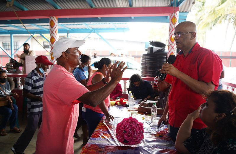 Vice-President, Dr Bharrat Jagdeo addressing farmers on the Essequibo Coast during a recent outreach there (DPI photo)