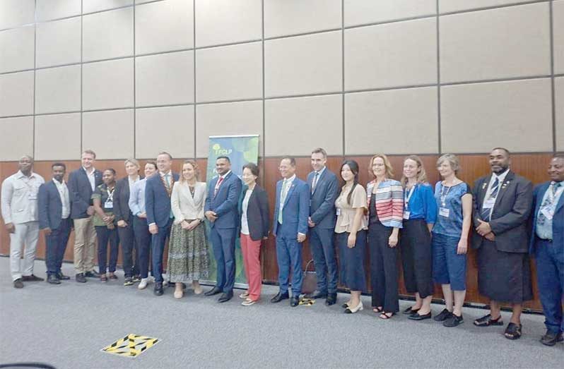 Minister of Natural Resources, Vickram Bharrat, in a photo-op with other COP 30 delegates