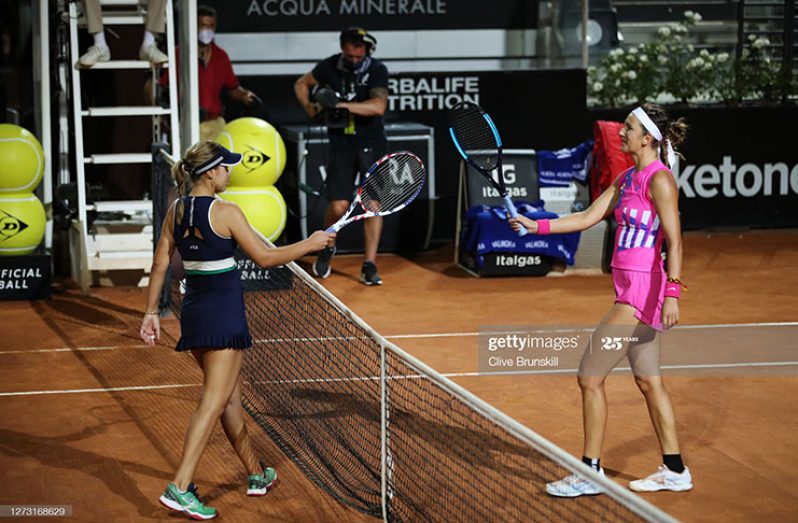 Victoria Azarenka of Belarus and Sofia Kenin of the United States interact at the net after their round two match during day four of the Internazionali BNL d'Italia at Foro Italico on September 17, 2020 in Rome, Italy. (Photo by Clive Brunskill/Getty Images)