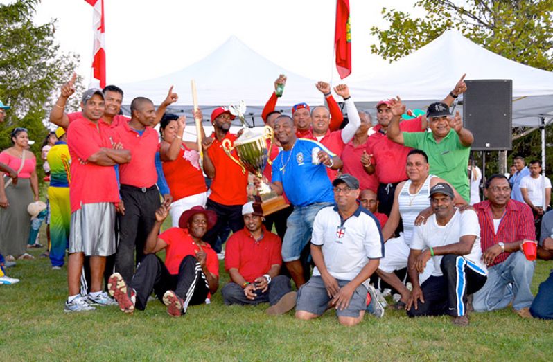 The victorious Our Own team pose with their supporters.