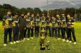 The victorious Toronto Rhinos players pose with their winnings