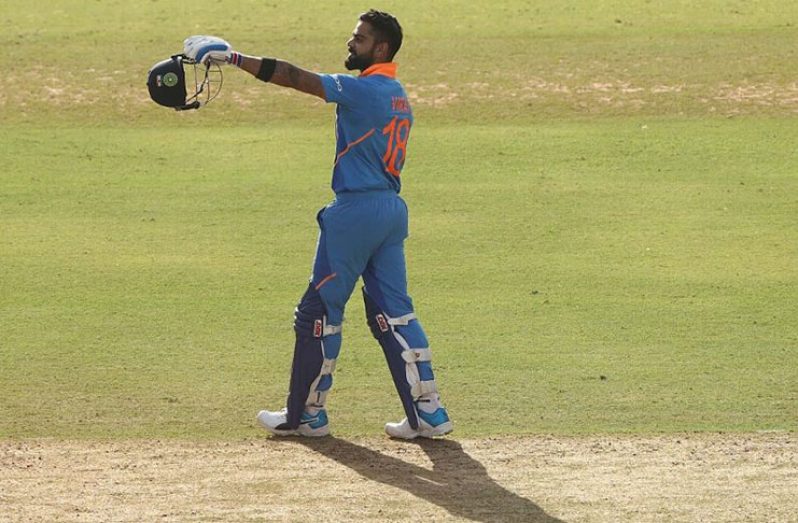 Virat Kohli celebrates his century. (Getty Images)